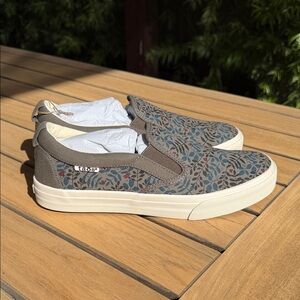 NWT: Taos stone-colored slip-on Sneakers with Blue Accents and cute ladybugs.
